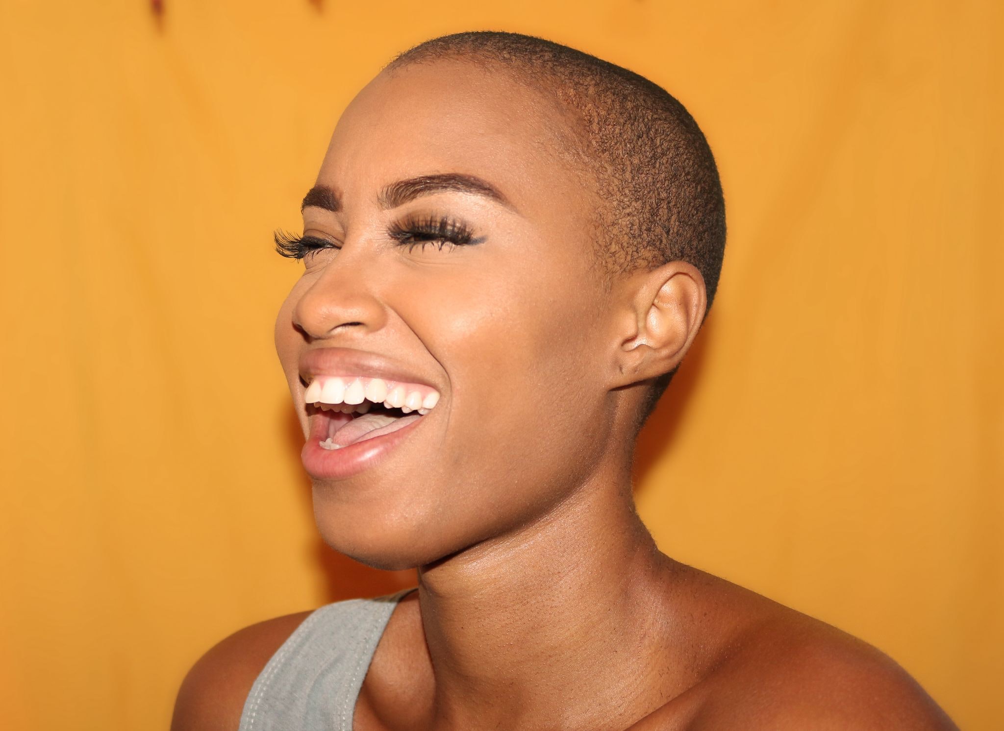 Beautiful woman with radiant glowing skin - facial treatment results
